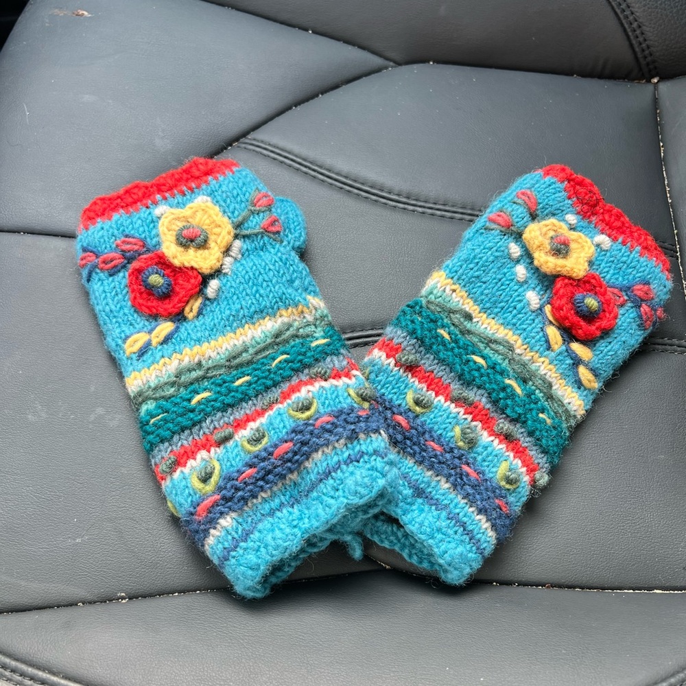 NWOT Sundance handmade in Nepal hand warmers.  Fleece lined teal and orange.